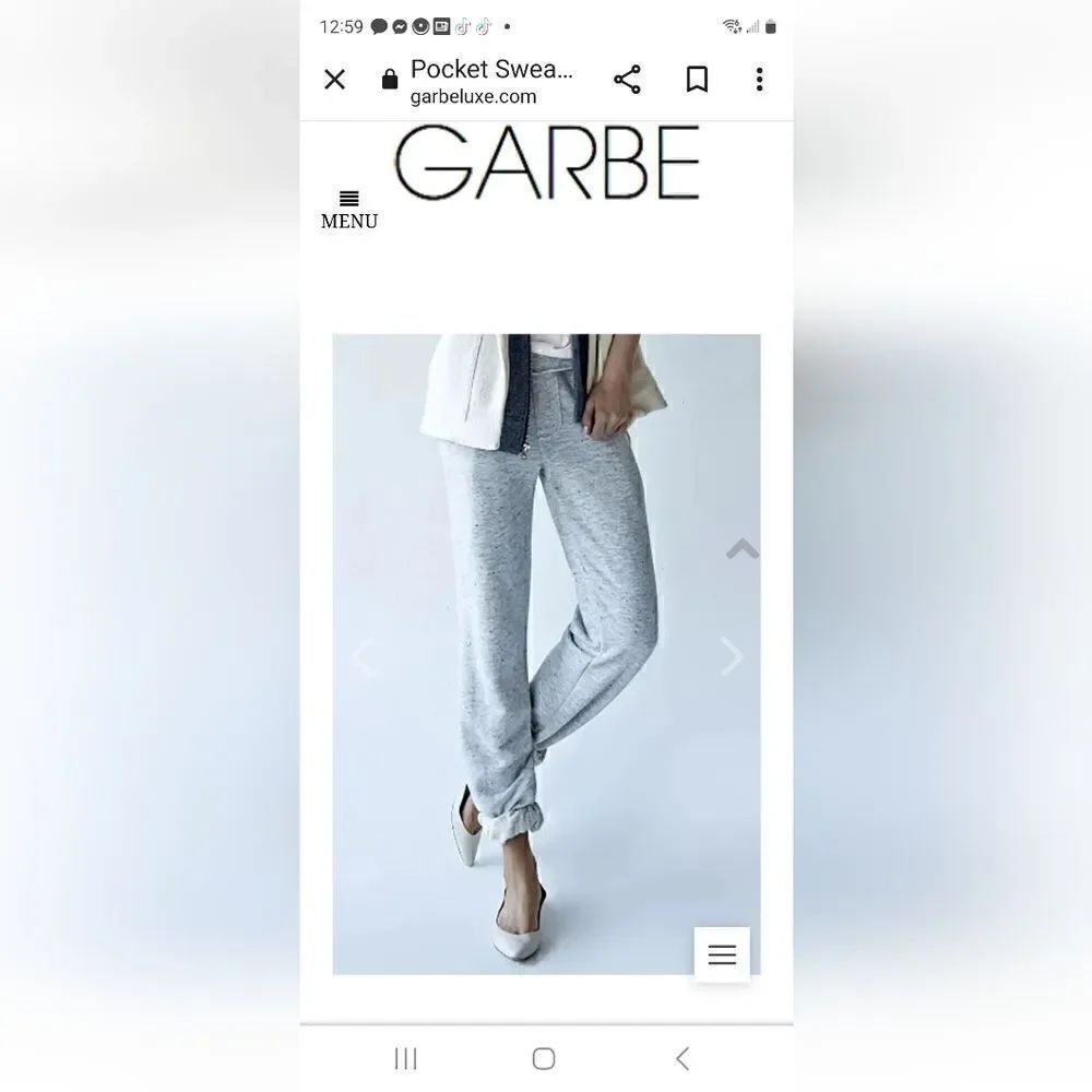 Garbe luxe Raw edge details, front pockets, cuffed hem. 100% supima cotton